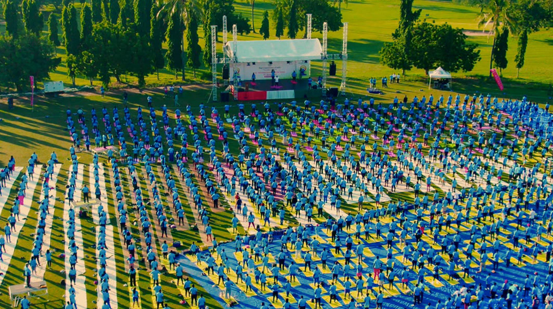12th International Day of Yoga attended by 2500+ participants in Dar es Salaam including Hon. Dr. Steven Kiruswa, Deputy Minister of Minerals of Tanzania (21 June 2026)